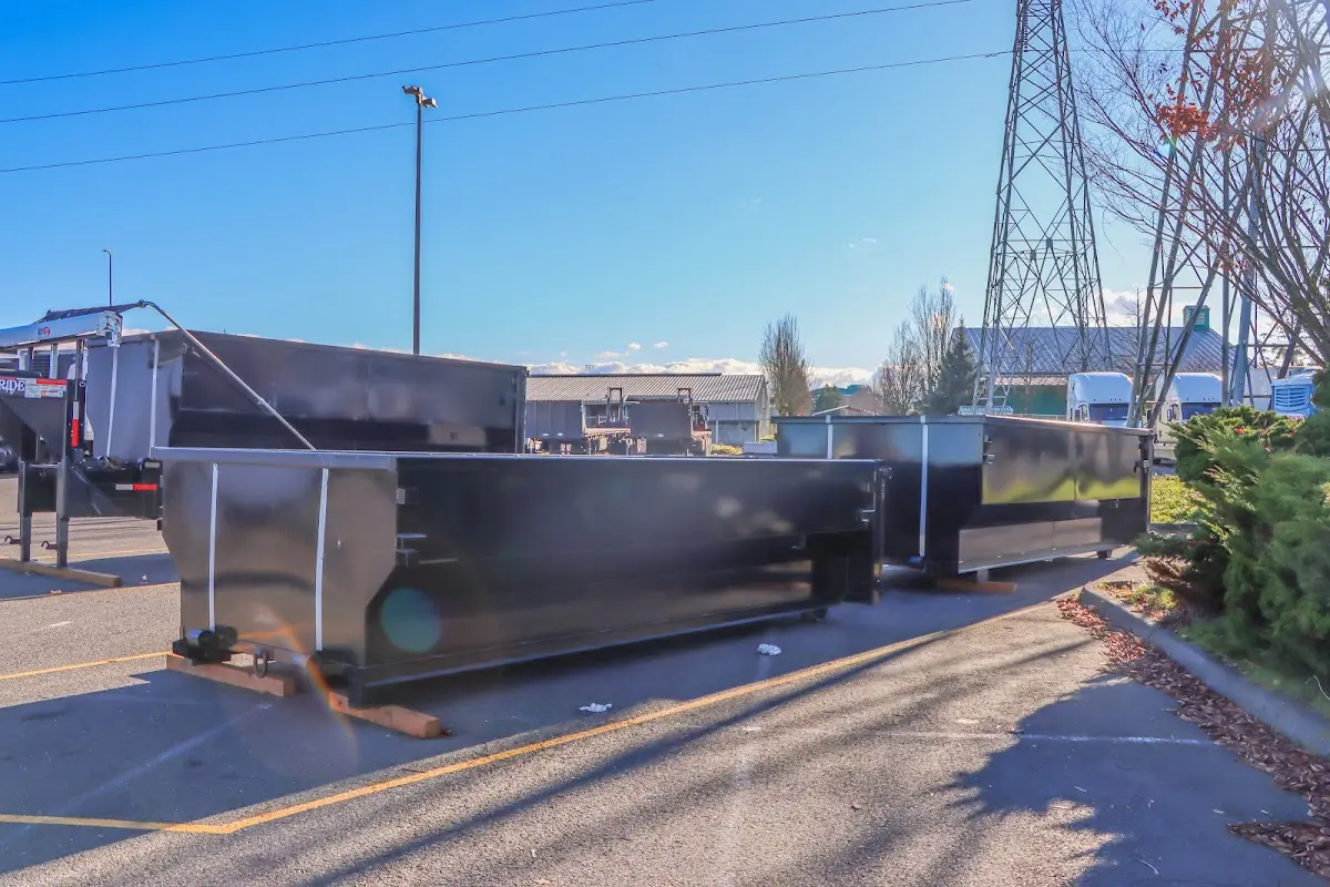 Roll-off dumpster ready for waste disposal at job site for Roofing Dumpster Rental in Dalton